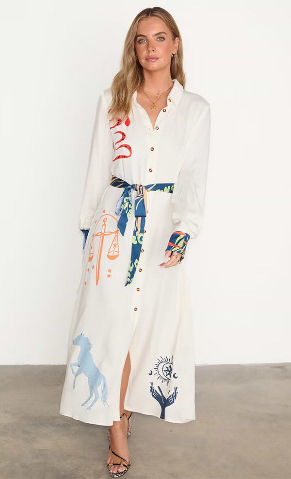model is wearing the mystical print shirt dress