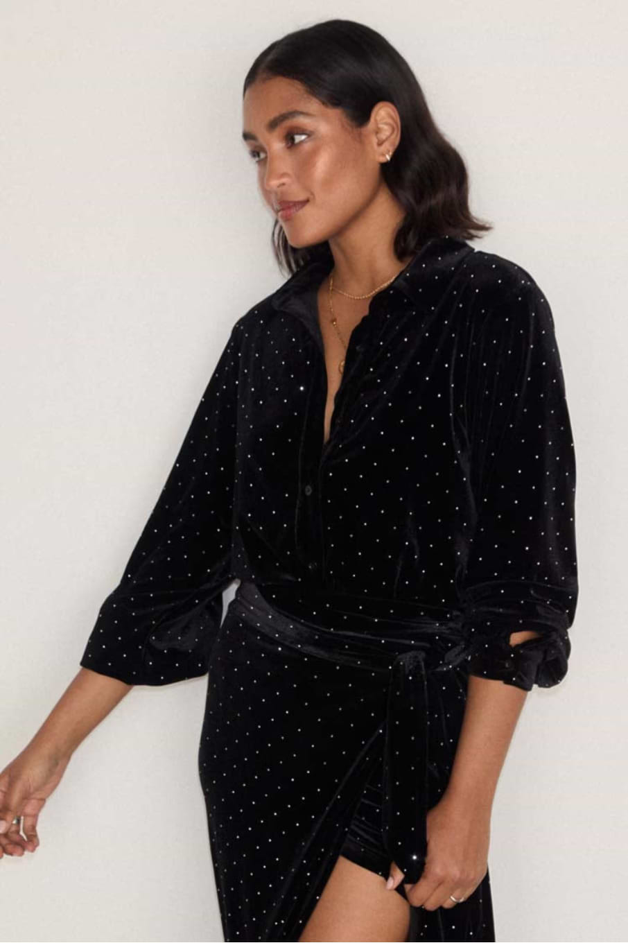 model is wearing the black velvet cristi shirt with silver studs with the matching jaspre skirt