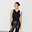 Black Ribbed Tank tucked into black leather-look trousers, a wardrobe staple designed in London.