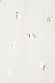 Gold foil snake print on white cotton and linen fabric for the Jaspre Wrap Skirt.