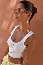 White Scoop Neck Rib Tank in soft stretch rib, a capsule wardrobe staple for effortless vacation dressing.