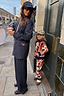 NFD Kids Aspen Jumper with a geometric knit pattern worn by a child on a London street.