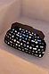 Black Beaded Mirror Bag featuring geometric silver mirror embellishments and a dark wooden handle.
