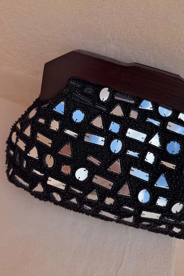 Black Beaded Mirror Bag with silver geometric glass embellishments and a dark wooden top handle.