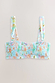 Blue Dreamer Shirred Bandeau Top in light blue with palm and sun motifs, designed in London with a smocked texture.