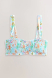 Blue Dreamer Shirred Bandeau Top in light blue with palm and sun motifs, designed in London with a smocked texture.