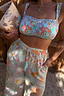 Thumbnail for Blue Dreamer Trouser in a pastel sun and star print, featuring an elasticated waistband with tassel detail.
