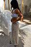 Blue Dreamer Trouser with a celestial sun and star print and elasticated tassel waist for vacation styling.