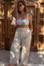 Thumbnail for Blue Dreamer Trouser with a celestial sun and star print, elasticated tassel waist and wide-leg fit for a vacation look.