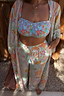 Blue Dreamer Trouser featuring a pastel celestial print and tassel waistband for inclusive sizing.