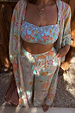 Blue Dreamer Trouser featuring a pastel celestial print and tassel waistband for inclusive sizing.