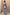 Thumbnail for Soleil Jeans in blue denim with oversized sun motifs, styled with the matching waistcoat as a co-ord set.