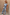 Thumbnail for Blue Soleil Denim Waistcoat with sun motifs and button fastening, styled as a London look co-ord.