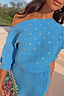 Thumbnail for Blue Plisse Tilly Dress with gold metallic spots and a draped off-the-shoulder neckline.