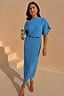 Thumbnail for Blue Plisse Tilly Dress with gold fleck detailing and a draped neckline, shown on a model against a neutral wall.