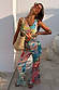 Blue Mari Plisse Trousers featuring a pastel paisley print and textured finish, styled as a summer co-ord.