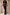 Thumbnail for Chocolate Sabine Dress in brown, styled as a strapless column maxi dress on a model against a rustic wall.