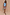 Thumbnail for Ice Blue Ribbed Tank Top with a high neck, styled with a patterned lace-trim skirt and statement necklace.