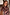 Thumbnail for Chocolate check floral top with a high neck and draped sleeves on a model wearing UK size 18.