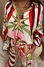 Thumbnail for Cirque Miley Shirt in a multi-coloured sun and star print, styled as a co-ord with matching trousers.