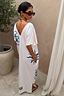 Thumbnail for Cream cotton Dolce Vita T-Shirt Dress with blue Greek-inspired sun motifs, side pockets and a multi-wear V-back.