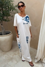 Cream cotton Dolce Vita T-Shirt Dress with blue hand-painted Greek motifs and side pockets in a maxi length.