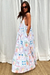 White Island Cross Stitch Maxi Dress featuring colorful tropical motifs, twisted rope straps and textured fabric.