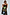 Thumbnail for Black Rio Maxi Dress with a vibrant tropical fruit print, styled with a shell necklace and straw hat.