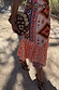 Thumbnail for Bridget Print Frida Dress featuring a multicoloured geometric print and a tiered frill skirt hem.