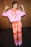 Thumbnail for Red Bandana Wide Leg Trousers in a knit print with pink hems, styled as a co-ord with a matching pink bandana jumper.