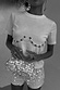 Thumbnail for Shells Hot Pants in cream with pearlescent shell beads, styled with a matching shell-embellished t-shirt and bag.