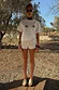 Thumbnail for Shells Hot Pants in cream with pearlescent sea shell beads, styled with a palm tree tee for a vacation look.