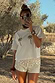 Cream Shells Hot Pants featuring pearlescent sea shell beading, paired with a palm tree t-shirt for a vacation look.