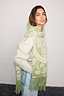 Thumbnail for Olive Amara Knit Scarf in green and cream with Mediterranean floral motifs and a long tasseled hem.
