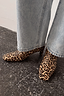 Thumbnail for Leopard print boots with a square toe and thin block heel, paired with light blue denim jeans.