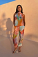 Abstract Lily Top with a vibrant multicoloured print and multi-wear tie neckline, styled as a co-ord.