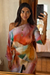 Abstract Scarf in a multi-colour print, styled as a multi-wear draped top with an off-the-shoulder neckline.