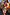 Thumbnail for Multi-wear Abstract Scarf styled as a waist tie on a matching dress to create a colourful dopamine dressing look.