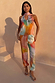 Abstract Naomi Trousers in a multicoloured print featuring a balloon leg shape and adjustable ankle ties.