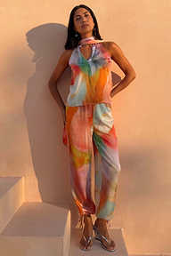 Abstract Naomi Trousers in a multicoloured print with a matching halter top and adjustable balloon leg ties.