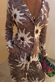 Chocolate Soleil Alexa Cardigan featuring a brown sun motif on ribbed fabric with button up front fastening.