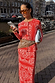 Iconic Red Bandana Alexa Cardigan in a ribbed knit, styled as a co-ord with a matching skirt and light blue clutch.