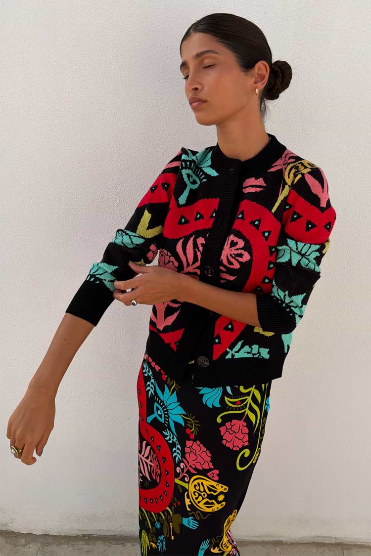 Black Amara Hollie Cardigan with iconic eye and heart motifs and button-up front, designed in London.