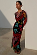 Black Amara Mesh Dress with hand-painted heart and eye motifs on a sheer long-sleeved silhouette.