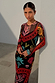 Black Amara Mesh Dress featuring colourful hand-painted motifs, long sleeves and a stretchy mesh fabric.