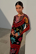 Black Amara Mesh Dress featuring colourful hand-painted motifs, long sleeves and a stretchy mesh fabric.