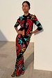 Black Amara Dorris Skirt with colourful hand-painted heart and eye motifs, styled with a matching cardigan.