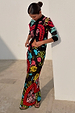 Black Amara Dorris Midi Skirt with hand painted heart and eye motifs, designed in London and styled with a cardigan.