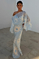 Blue Soleil Anais Dress with a Mediterranean sun print, draped sheer off-shoulder top, and sleek bias-cut skirt.
