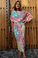 Animal Print Tilly Dress in a multicoloured metallic fleck print, with a voluminous top and fitted midaxi skirt.